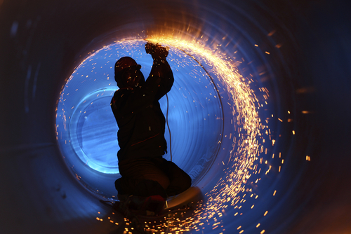 grinding welds down in a pipe